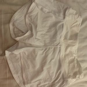 white tall lululemon shorts